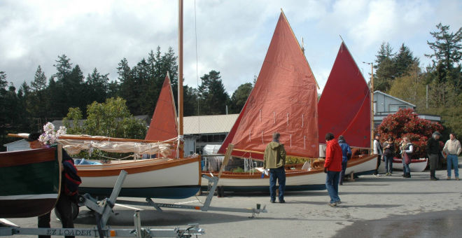 Wooden boat building school launch festival